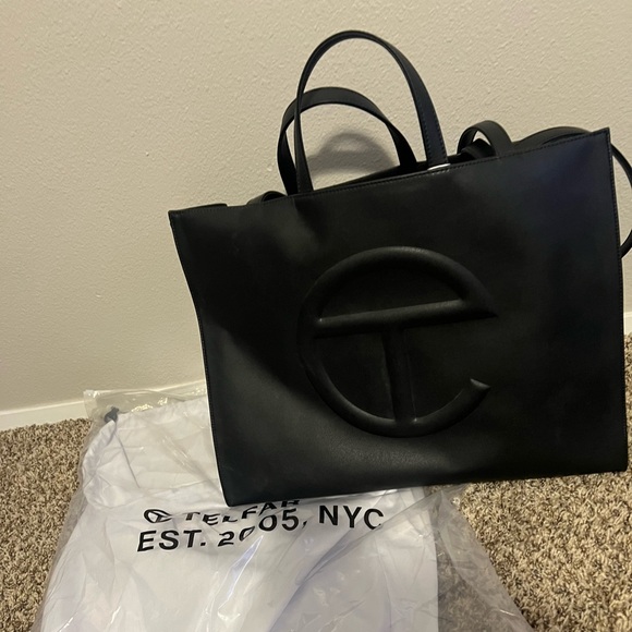Telford large black shopper. Never used only took out of dust bag for pictures.